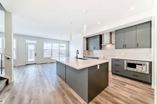 54 Bartlett Row Se, Calgary, AB - Indoor Photo Showing Kitchen With Upgraded Kitchen