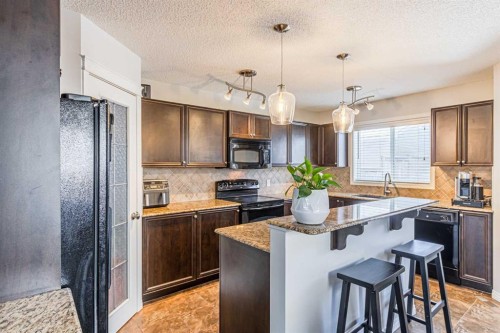 100 Silverado Plains View Sw, Calgary, AB - Indoor Photo Showing Kitchen With Upgraded Kitchen