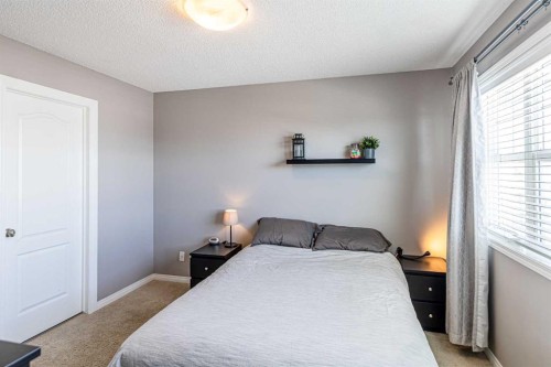100 Silverado Plains View Sw, Calgary, AB - Indoor Photo Showing Bedroom