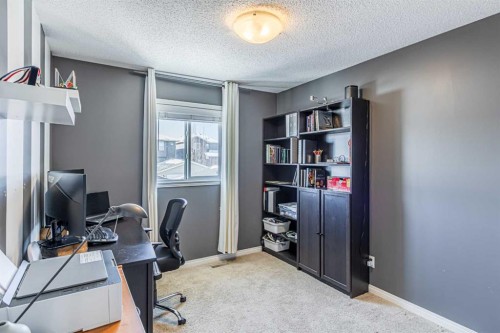 100 Silverado Plains View Sw, Calgary, AB - Indoor Photo Showing Office