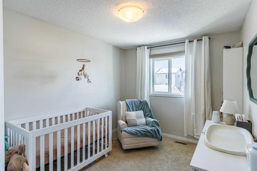 100 Silverado Plains View Sw, Calgary, AB - Indoor Photo Showing Bedroom