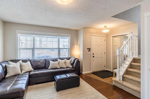 100 Silverado Plains View Sw, Calgary, AB - Indoor Photo Showing Living Room