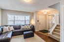 100 Silverado Plains View Sw, Calgary, AB  - Indoor Photo Showing Living Room 