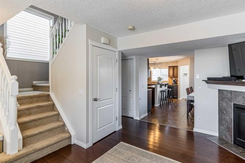 100 Silverado Plains View Sw, Calgary, AB - Indoor With Fireplace
