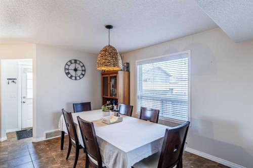 100 Silverado Plains View Sw, Calgary, AB - Indoor Photo Showing Dining Room