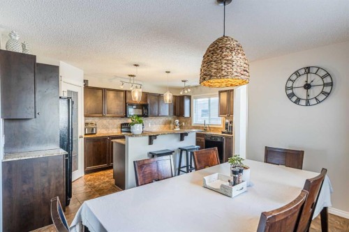 100 Silverado Plains View Sw, Calgary, AB - Indoor Photo Showing Dining Room