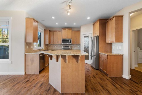 139 Coopers Hill Sw, Airdrie, AB - Indoor Photo Showing Kitchen With Stainless Steel Kitchen