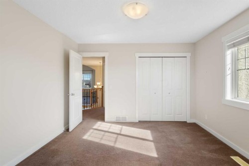 139 Coopers Hill Sw, Airdrie, AB - Indoor Photo Showing Other Room