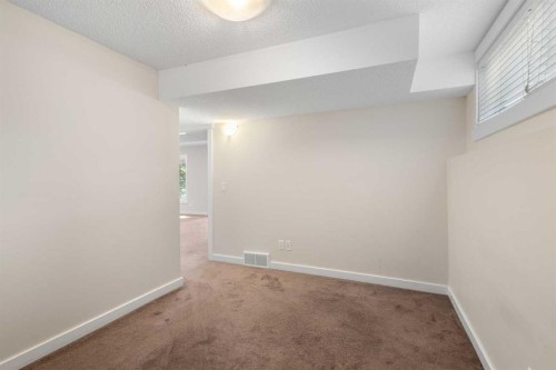 139 Coopers Hill Sw, Airdrie, AB - Indoor Photo Showing Other Room