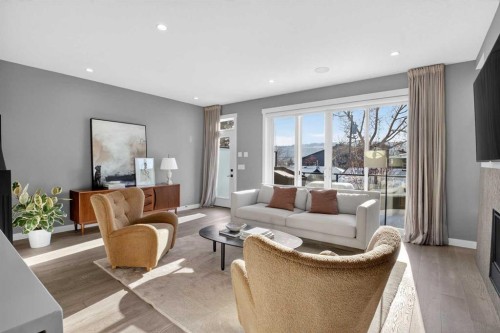 4909 21 Avenue Nw, Calgary, AB - Indoor Photo Showing Living Room With Fireplace