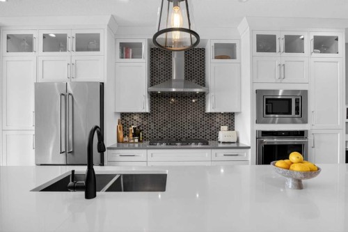 4909 21 Avenue Nw, Calgary, AB - Indoor Photo Showing Kitchen With Stainless Steel Kitchen With Double Sink With Upgraded Kitchen