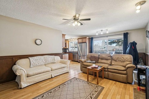 144 Waldron Avenue, Okotoks, AB - Indoor Photo Showing Living Room