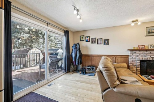 144 Waldron Avenue, Okotoks, AB - Indoor With Fireplace