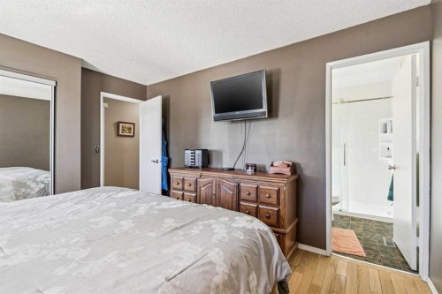 144 Waldron Avenue, Okotoks, AB - Indoor Photo Showing Bedroom