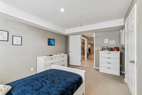 144 Waldron Avenue, Okotoks, AB - Indoor Photo Showing Bedroom