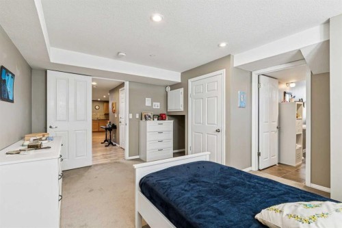144 Waldron Avenue, Okotoks, AB - Indoor Photo Showing Bedroom