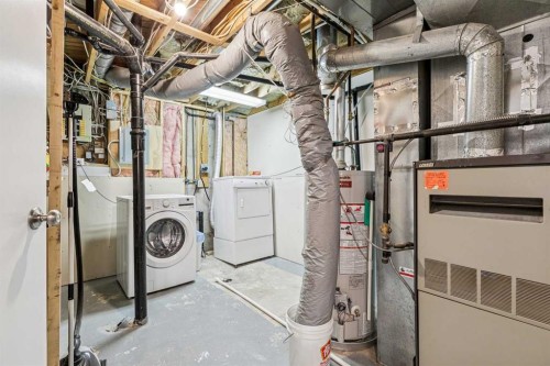 144 Waldron Avenue, Okotoks, AB - Indoor Photo Showing Laundry Room