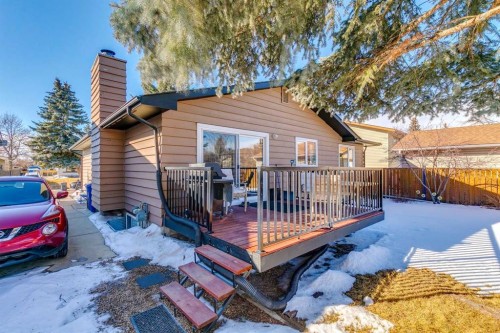 144 Waldron Avenue, Okotoks, AB - Outdoor With Deck Patio Veranda