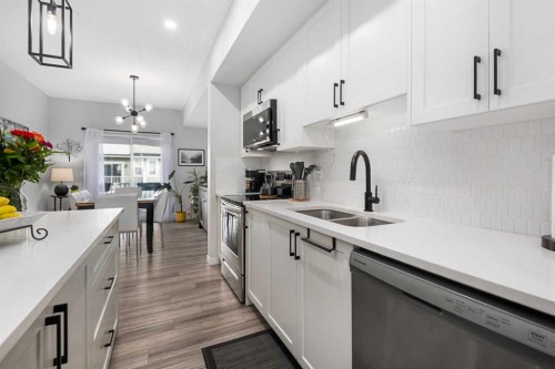 325 Copperstone Manor Se, Calgary, AB - Indoor Photo Showing Kitchen With Double Sink With Upgraded Kitchen