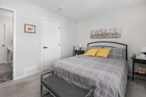 325 Copperstone Manor Se, Calgary, AB - Indoor Photo Showing Bedroom