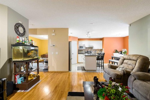 332 Harvest Hills Drive Ne, Calgary, AB - Indoor Photo Showing Living Room