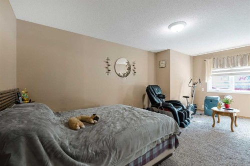 332 Harvest Hills Drive Ne, Calgary, AB - Indoor Photo Showing Bedroom