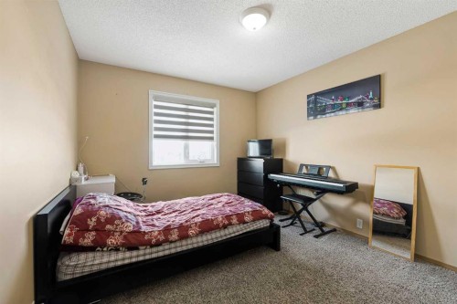 332 Harvest Hills Drive Ne, Calgary, AB - Indoor Photo Showing Bedroom