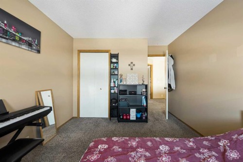 332 Harvest Hills Drive Ne, Calgary, AB - Indoor Photo Showing Bedroom