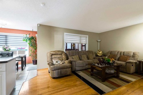 332 Harvest Hills Drive Ne, Calgary, AB - Indoor Photo Showing Living Room