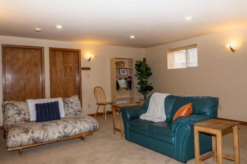 80 Westover Drive Sw, Calgary, AB - Indoor Photo Showing Living Room