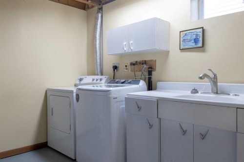 80 Westover Drive Sw, Calgary, AB - Indoor Photo Showing Laundry Room