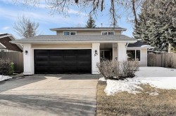815 Woodpark Way SW Calgary, AB T2W 2T9
