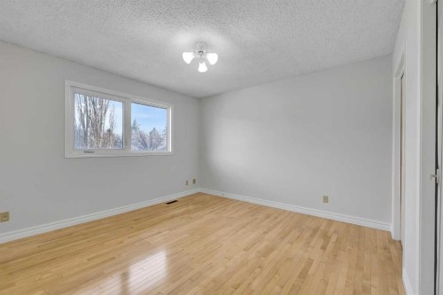 815 Woodpark Way Sw, Calgary, AB - Indoor Photo Showing Other Room