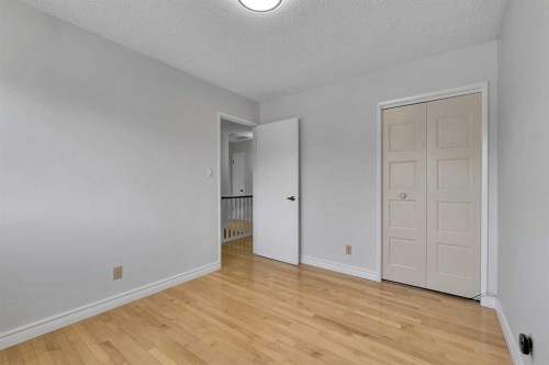 815 Woodpark Way Sw, Calgary, AB - Indoor Photo Showing Other Room