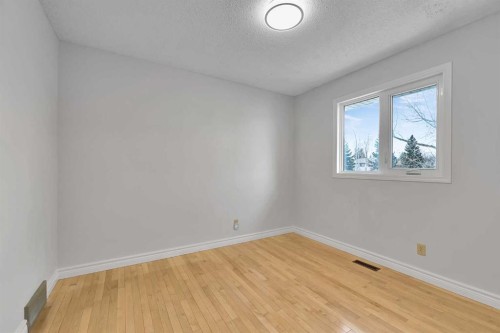 815 Woodpark Way Sw, Calgary, AB - Indoor Photo Showing Other Room