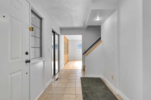 815 Woodpark Way Sw, Calgary, AB - Indoor Photo Showing Other Room
