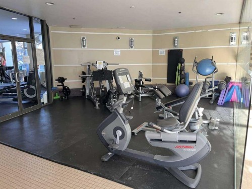 1205-1088 6 Avenue Sw, Calgary, AB - Indoor Photo Showing Gym Room