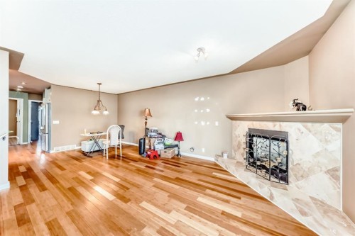274 Templeview Way Ne, Calgary, AB - Indoor With Fireplace