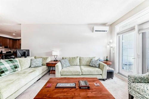 210-1005A Westmount Drive, Strathmore, AB - Indoor Photo Showing Living Room