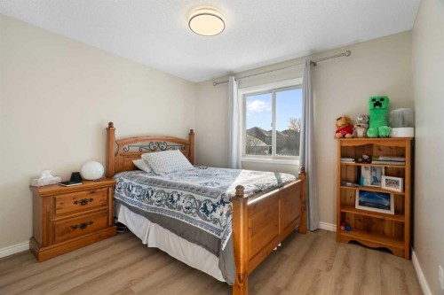 165 Harvest Park Circle Ne, Calgary, AB - Indoor Photo Showing Bedroom