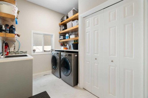 165 Harvest Park Circle Ne, Calgary, AB - Indoor Photo Showing Laundry Room