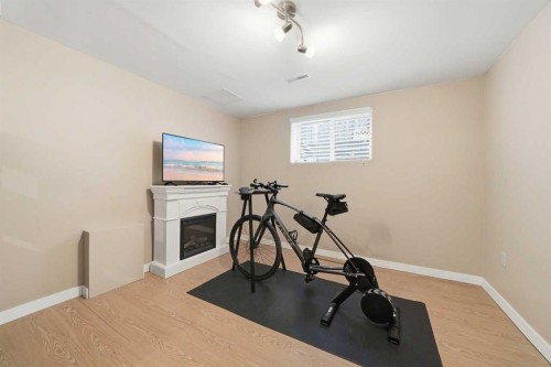 132 Shawcliffe Circle Sw, Calgary, AB - Indoor Photo Showing Gym Room