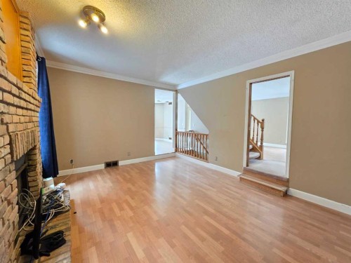 52 Sunvale Mews Se, Calgary, AB - Indoor Photo Showing Other Room