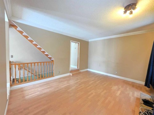 52 Sunvale Mews Se, Calgary, AB - Indoor Photo Showing Other Room