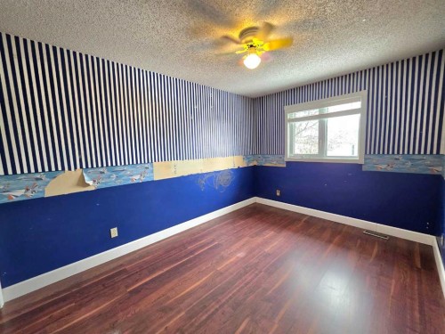 52 Sunvale Mews Se, Calgary, AB - Indoor Photo Showing Other Room