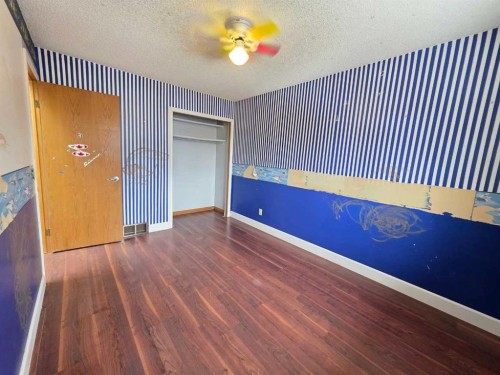 52 Sunvale Mews Se, Calgary, AB - Indoor Photo Showing Other Room