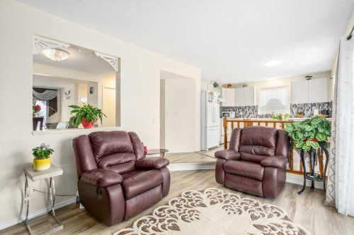 43 Millrise Crescent Sw, Calgary, AB - Indoor Photo Showing Living Room
