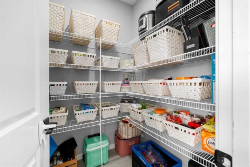 92 Wolf Gate, Okotoks, AB - Indoor With Storage