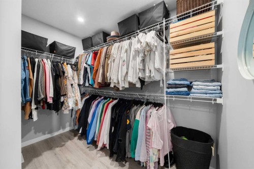 92 Wolf Gate, Okotoks, AB - Indoor With Storage