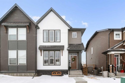 92 Wolf Gate, Okotoks, AB - Outdoor With Facade